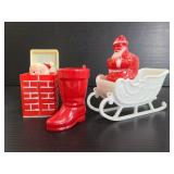 Three vintage plastic Santa theme figures