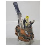 Paint bucket of assorted home work supplies