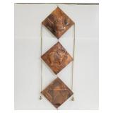 Embossed metal wall art hanging