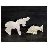 Carved stone dolphin & donkey figures