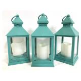 Three blue plastic lanterns w/ faux candles