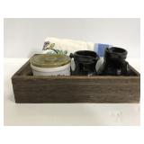 Wood tray of pottery and embroidered cloth