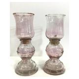 Two vintage pink tinted glass candle holders