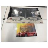 Trio of vintage car posters