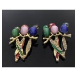 Pair of gold tone Bork pins w/ cat eye stones