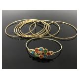 Gold tone bangle bracelet collection