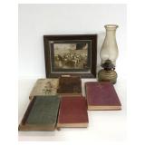 Vintage books, school house picture, and oil lamp