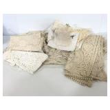 Assorted elegant lace-like linens