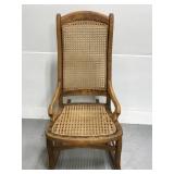 Antique armless rocking chair w/modern work