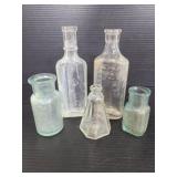 Five vintage glass jars