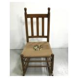 Vintage rocking chair w/ embroidered flower seat