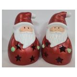 Two Holiday Home Santa candle holders