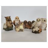 Stone and resin owl figurines