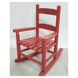 Small red childs rocking chair