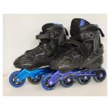 Pair of blue ABEC Schwinn adult size roller blades