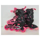 Pair of pink youth roller derby roller blades
