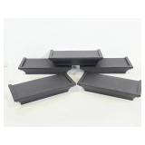 Five black floating wall shelves