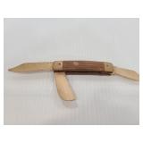 Carved wood faux pocket knife