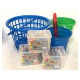 Assorted outdoor sand buckets, chalk, and bubbles