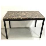 Black and brown faux marble topped dining table