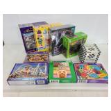 Nine assorted jigsaw puzzles