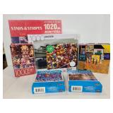 Seven assorted 1,000 piece jigsaw puzzles