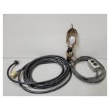Work light, extension cord and wall outlet combo
