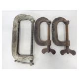 Three assorted metal work clamps
