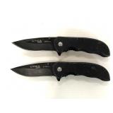 Two UTICA USA black handled pocket knives