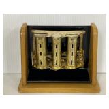 Vintage coin sorter on wooden stand
