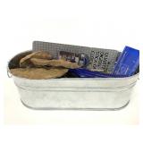 Tin container of assorted junk drawer goodies