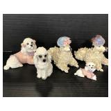 Five poodle pup figurines