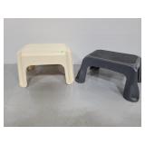 Two plastic footstools