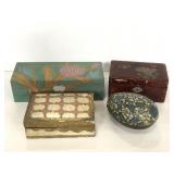 Four assorted floral painted trinket boxes
