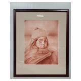 Framed and signed print of a woman