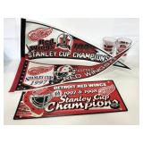 Red Wings fan glasses, pennant flags and sign
