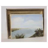 Signed on back lake and sky painting w/ frame