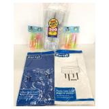 Unopened disposable table cloths & shot glasses