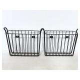 Two metal wall mount magazine racks