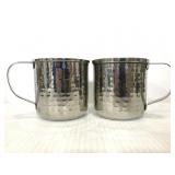 Pair of hammered metal mugs
