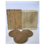 Two wood cutting boards & cork trivets