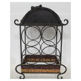 Wrought iron and woven wine bottle rack