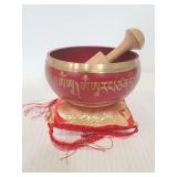 Middle Eastern tranquil sound bowl on pillow