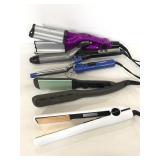 Five curling irons, straighteners, and crimper