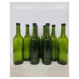 Eight wine bottles