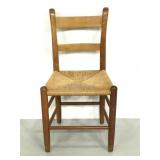 Armless wooden chair w/woven seat