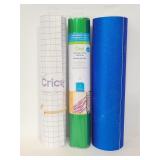Three rolls of Cricut vinyl