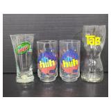 Four soda pop glasses