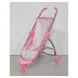 Pink polka dot baby doll stroller