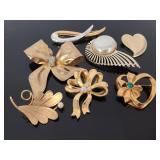 Vintage gold tone brooch collection